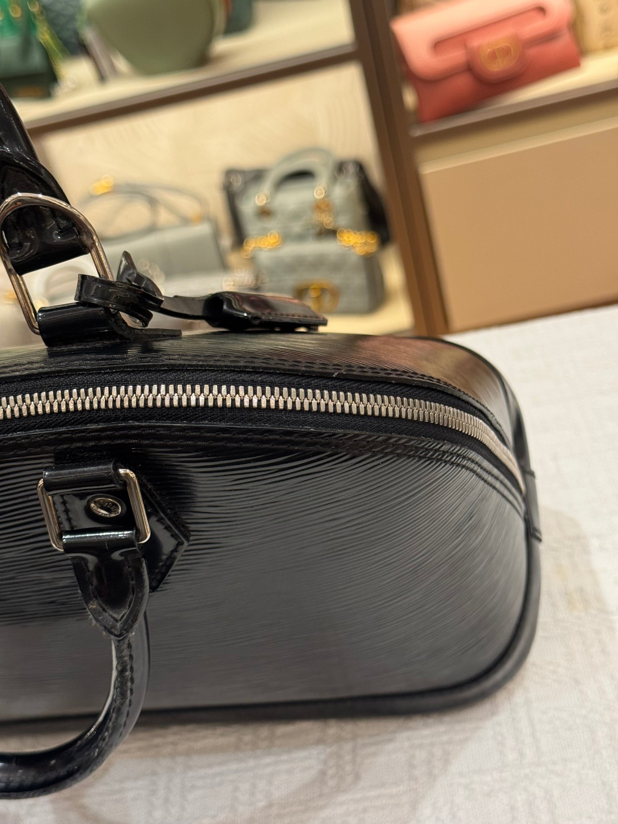 Louis Vuitton Alma PM Epi black Patent