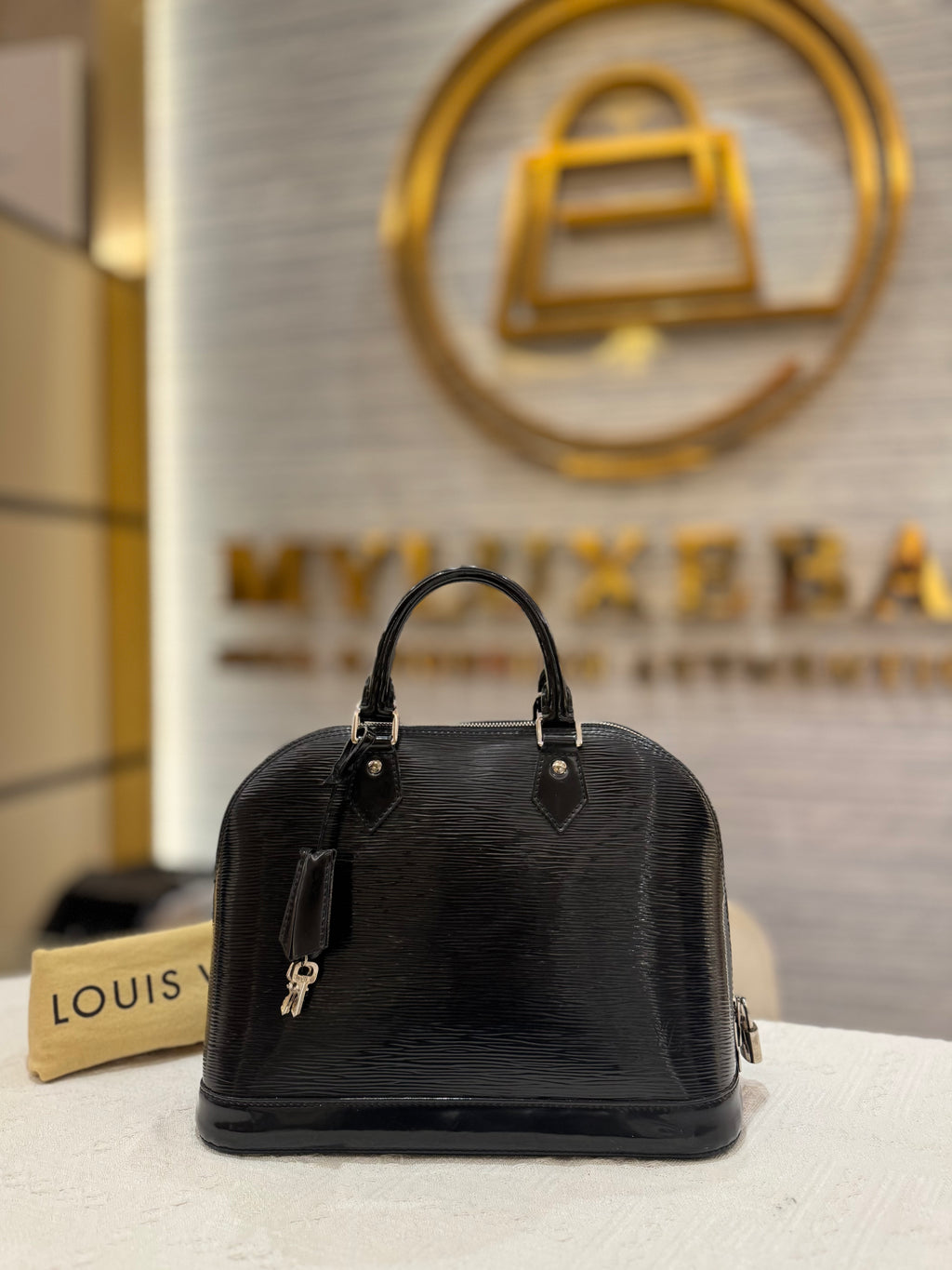Louis Vuitton Alma PM Epi black Patent